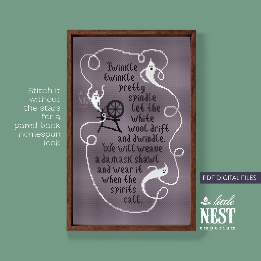 spooky spindle cross stitch chart, sewn in black and white threads on a lilac fabric