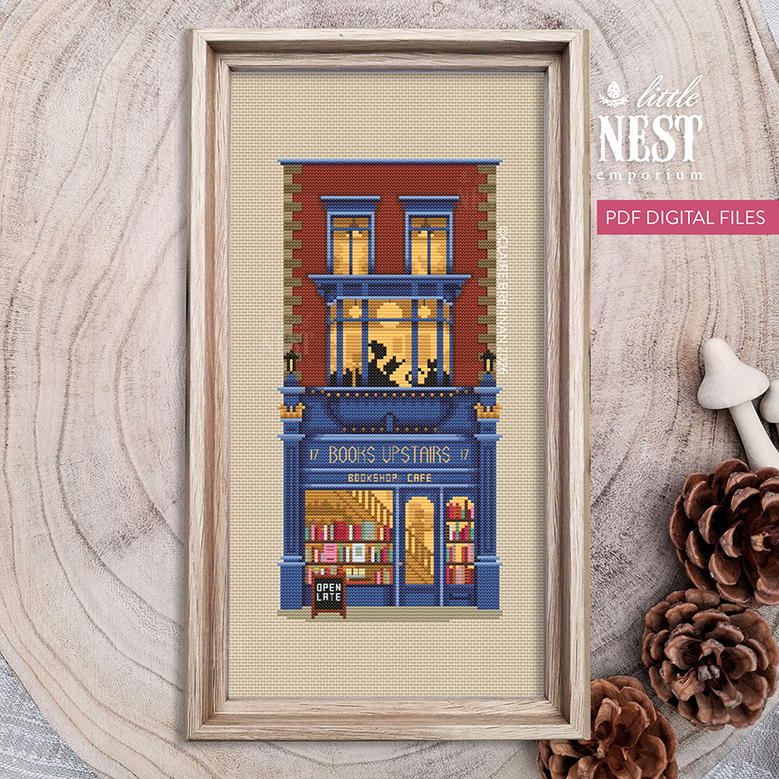 A cross stitch pattern based on a bookshop. The storefront is inspired by the elegant Georgian frontage of 'Books Upstairs' in Dublin