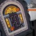 Cross stitch design og a Black Georgian Doorway, with a fanlight and side windows - in front of the door is a cat, two pumpkins and 3 rats, behind the door a ghost is partially seen
