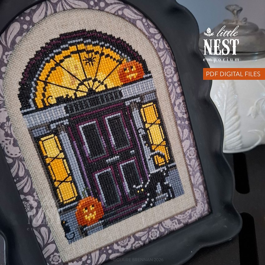 Cross stitch design og a Black Georgian Doorway, with a fanlight and side windows - in front of the door is a cat, two pumpkins and 3 rats, behind the door a ghost is partially seen